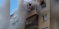 【衝撃映像】炎上するマンションの５階から飛び降りる家族！ 地上で受け止める住人たち！【救出劇】